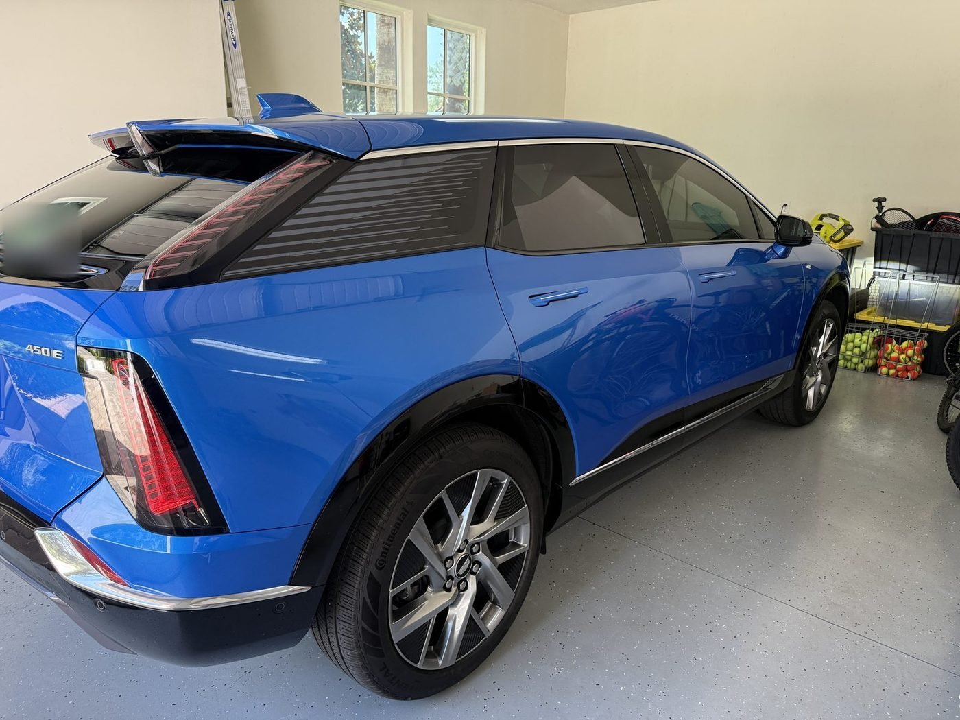Cadillac Optiq parked at a home in Pablo Creek Reserve, Jacksonville, FL after Pure Power Electrical installed its Level 2 EV charger