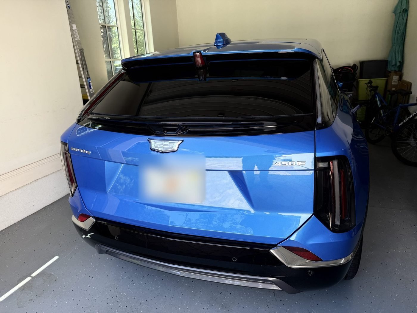Cadillac Optiq parked at a home in Pablo Creek Reserve, Jacksonville, FL after Pure Power Electrical installed its Level 2 EV charger