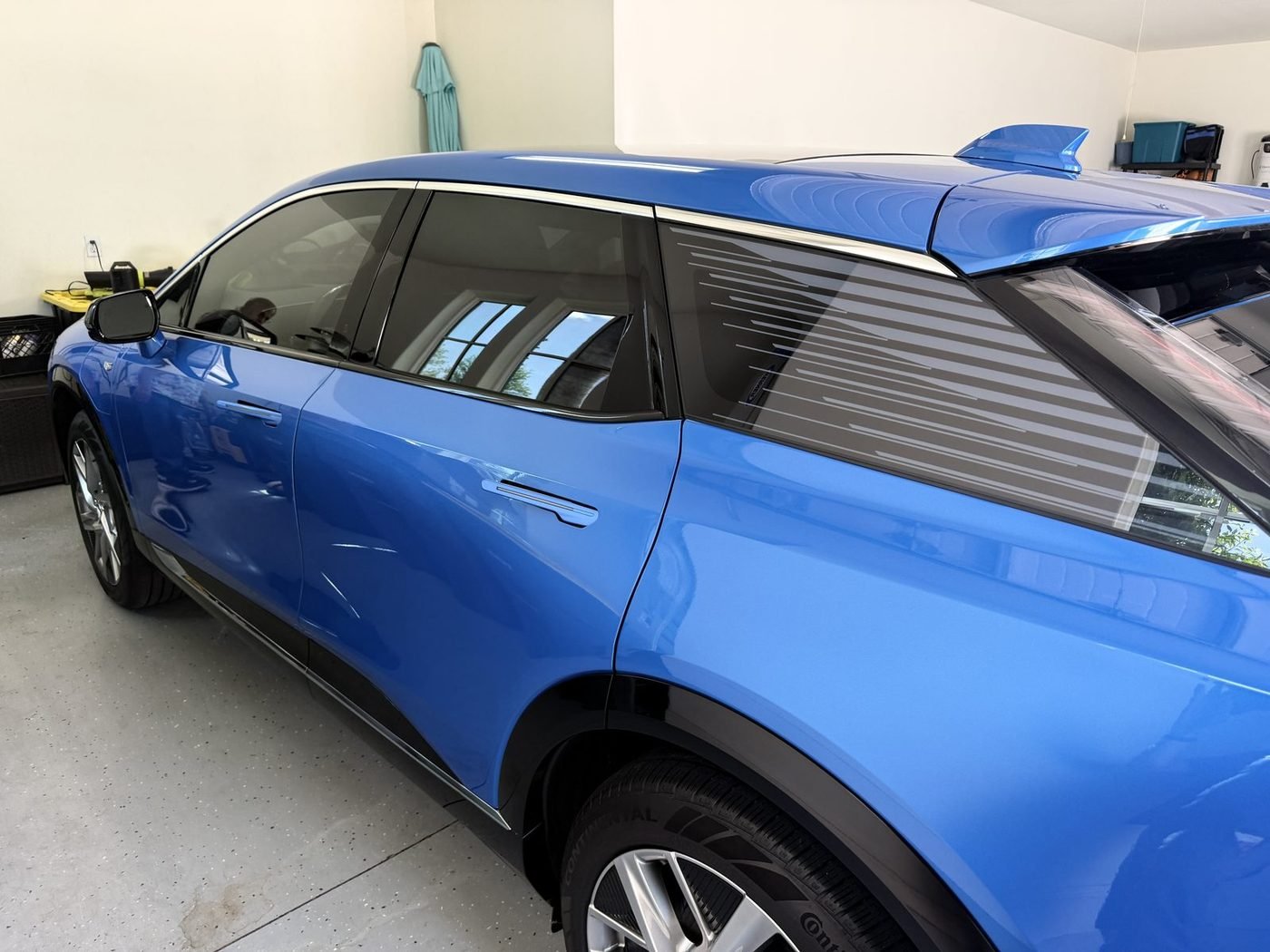 Cadillac Optiq parked at a home in Pablo Creek Reserve, Jacksonville, FL after Pure Power Electrical installed its Level 2 EV charger