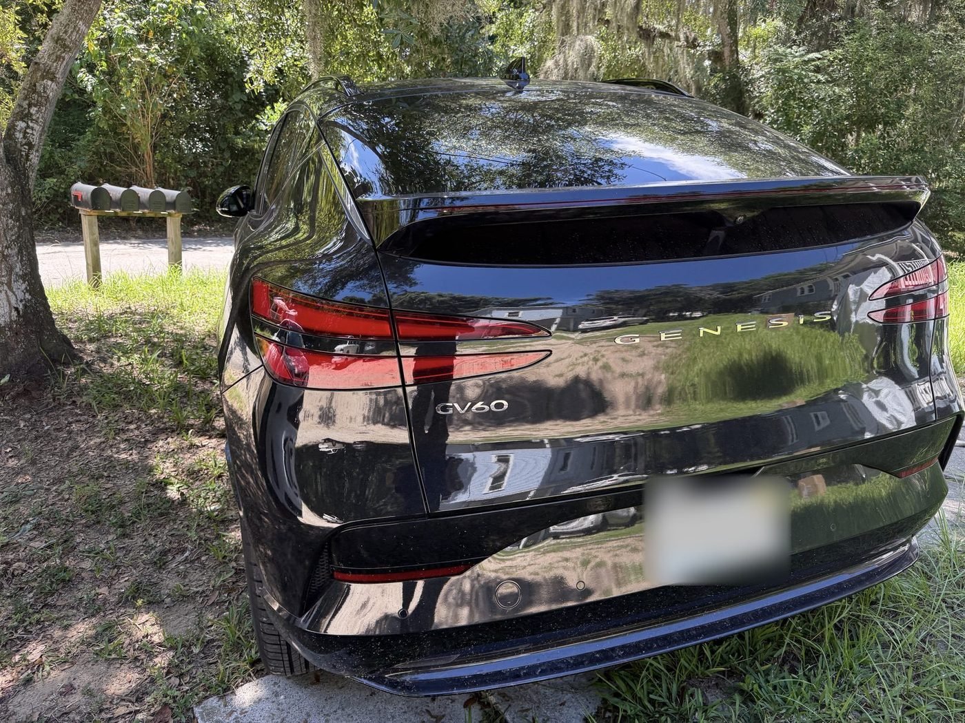 Genesis GV60 parked at a home in West Augustine, St. Augustine, FL after Pure Power Electrical installed its Level 2 EV charger