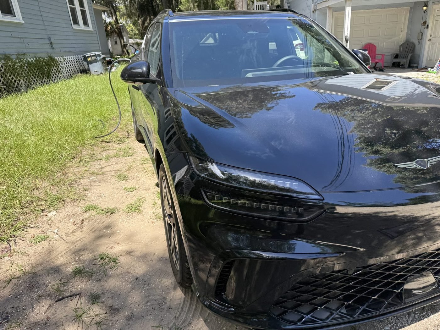 Genesis GV60 charging from a Level 2 EV charger installed by Pure Power Electrical in West Augustine, St. Augustine, FL