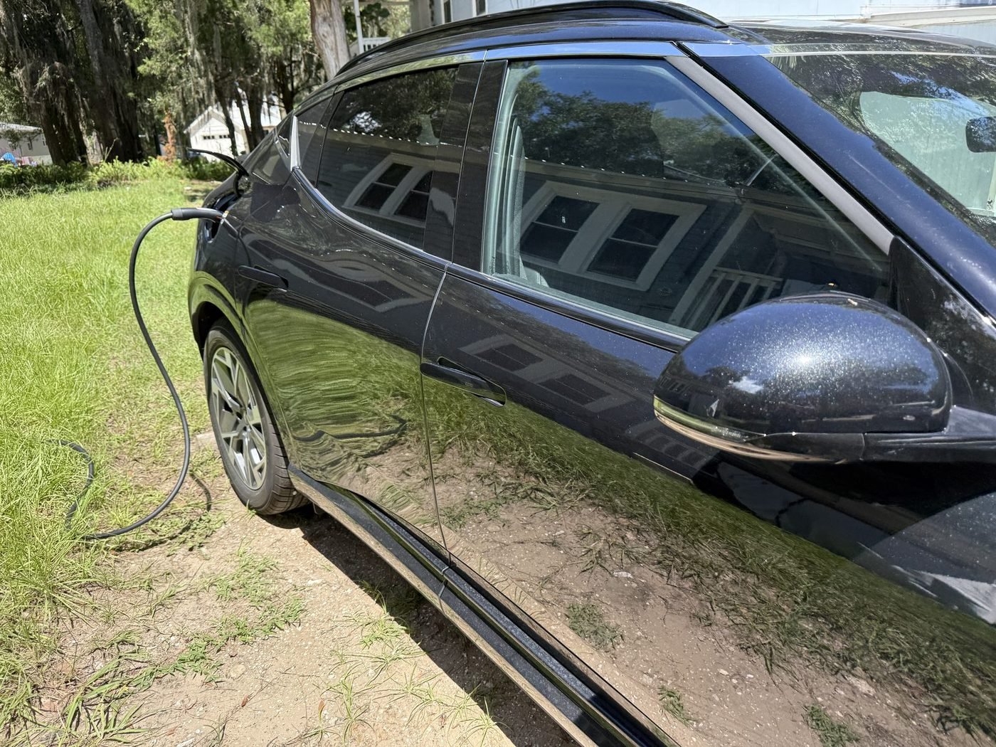Genesis GV60 charging from a Level 2 EV charger installed by Pure Power Electrical in West Augustine, St. Augustine, FL