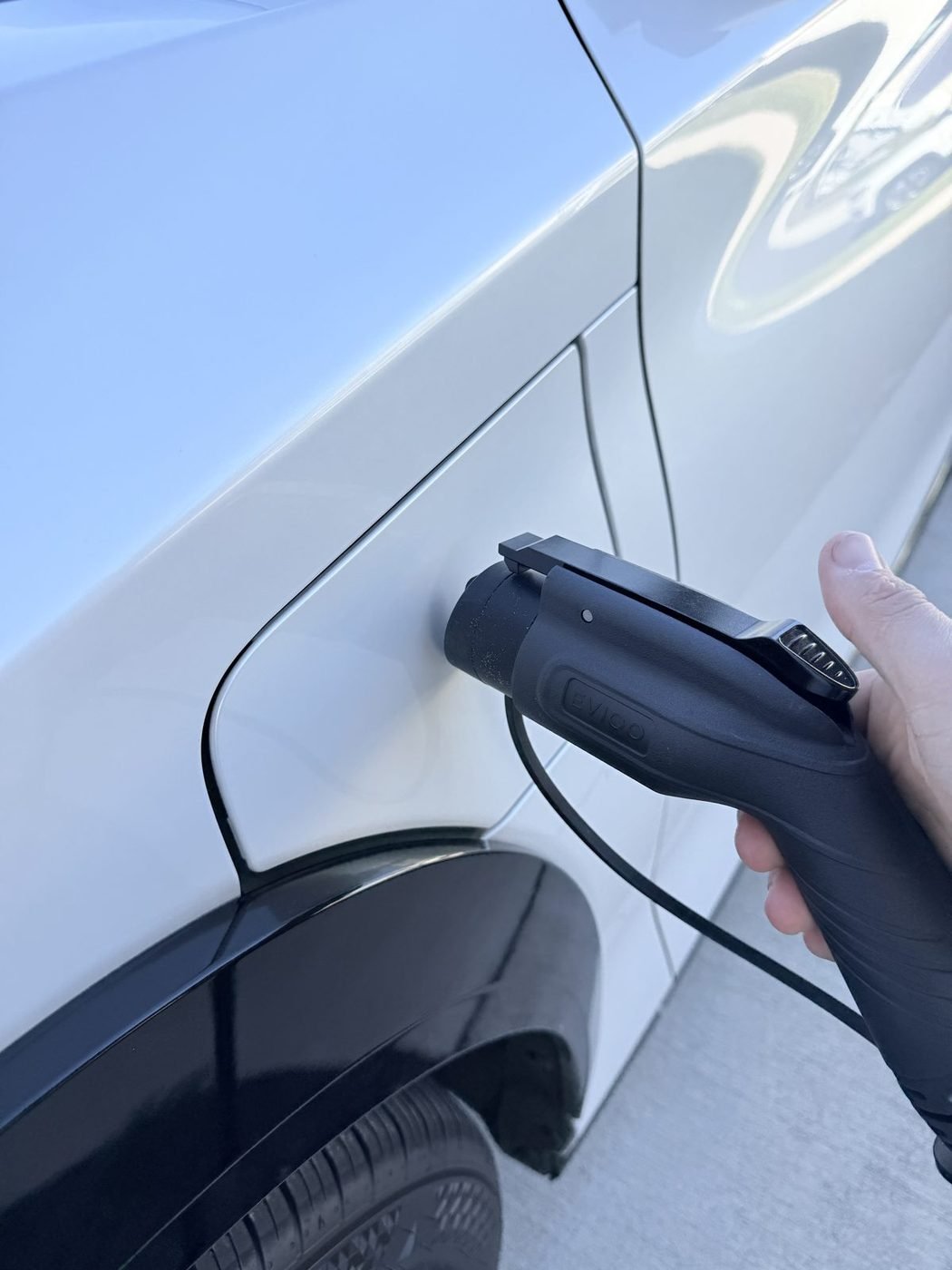 Lexus RZ 450e charging from a outdoor Level 2 EV charger installed by Pure Power Electrical in Beacon Lake, St. Johns County, FL