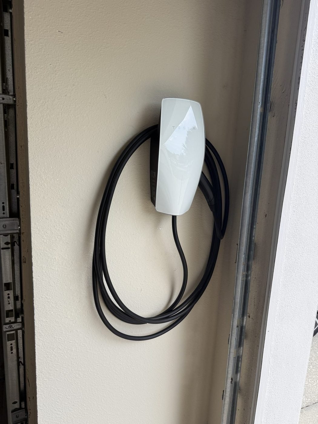 Tesla Universal Wall Connector installed by Pure Power Electrical in Greenleaf Village, Nocatee, FL