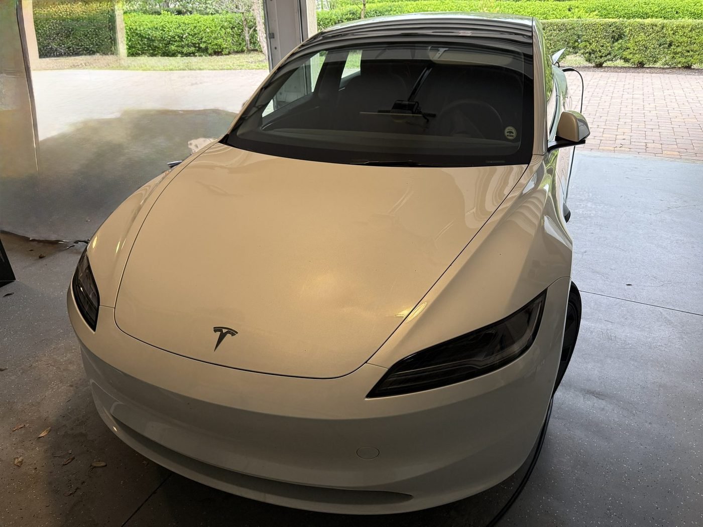 Tesla Model 3 parked at a home in Pablo Creek Reserve, Jacksonville, FL after Pure Power Electrical installed its Tesla Wall Connector